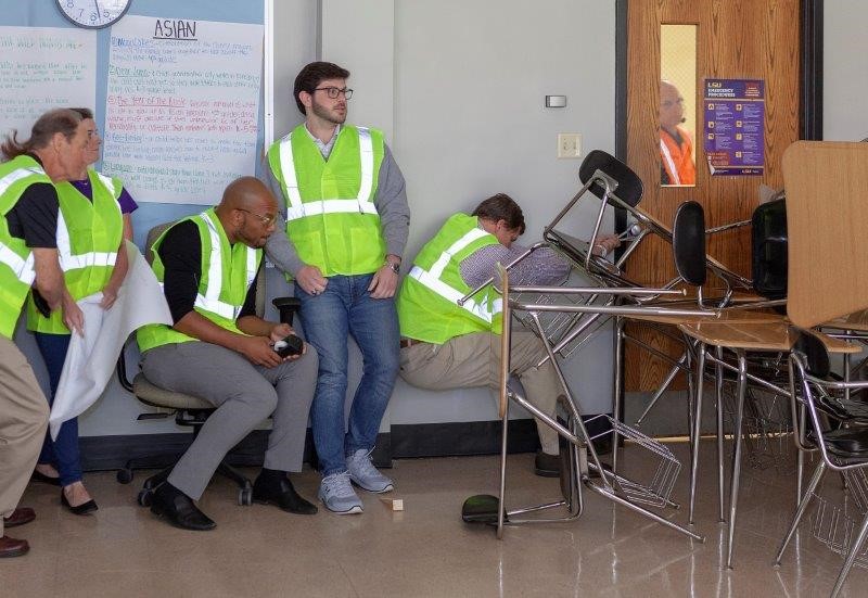 LSU employees practice securing a door under an active threat scenario. 
